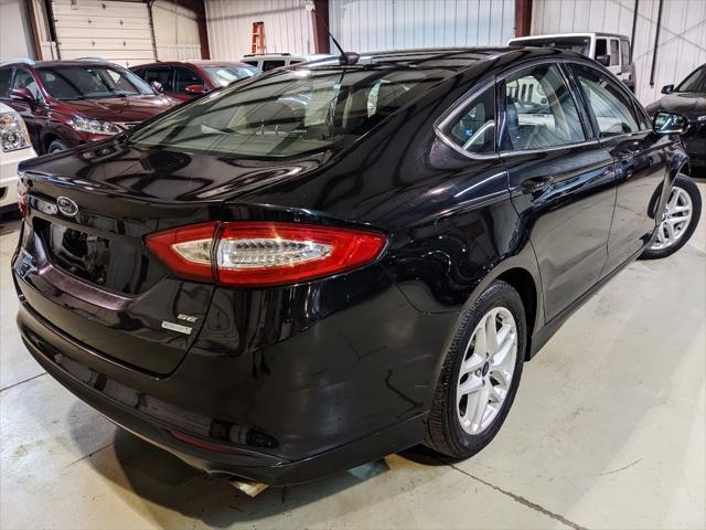 used 2014 Ford Fusion car, priced at $7,950