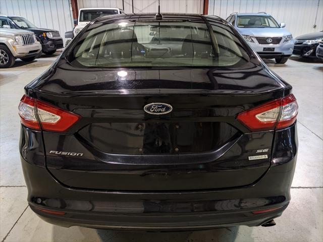 used 2014 Ford Fusion car, priced at $7,950