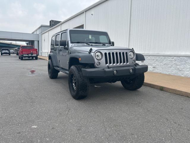 used 2018 Jeep Wrangler JK Unlimited car, priced at $21,844
