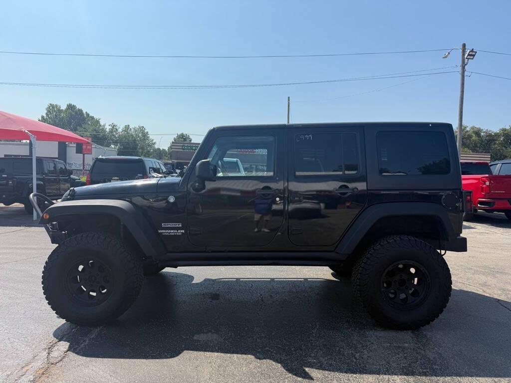 used 2013 Jeep Wrangler Unlimited car, priced at $13,988
