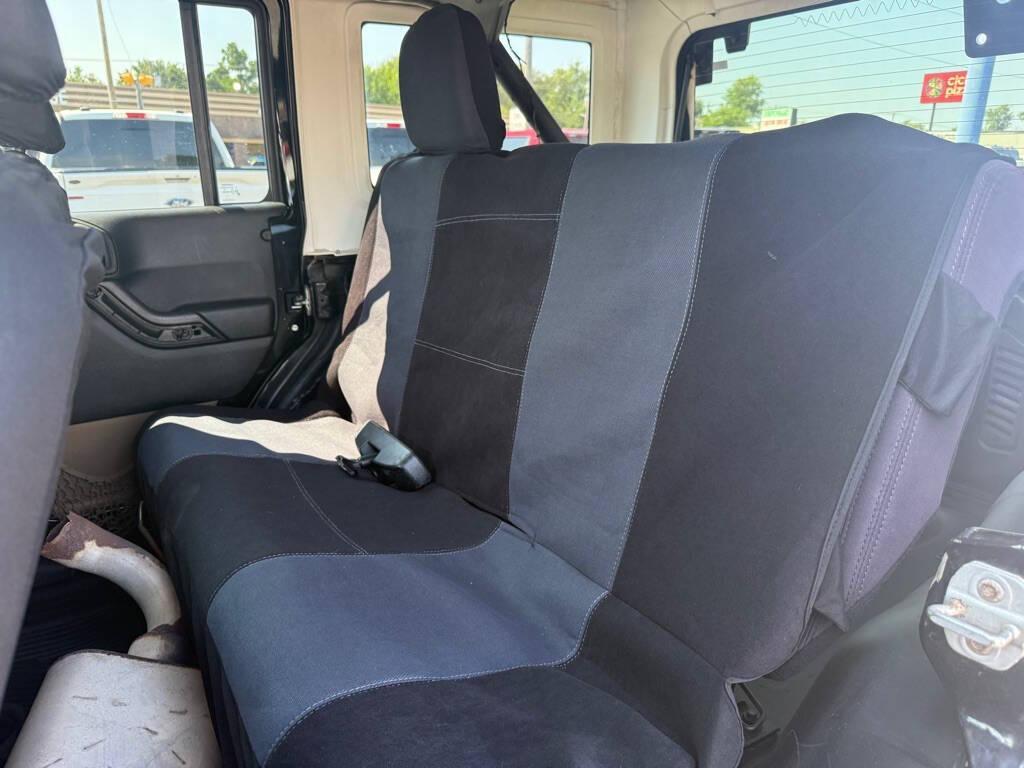 used 2013 Jeep Wrangler Unlimited car, priced at $13,988