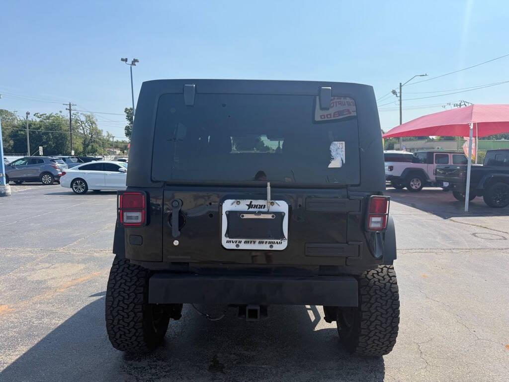 used 2013 Jeep Wrangler Unlimited car, priced at $13,988