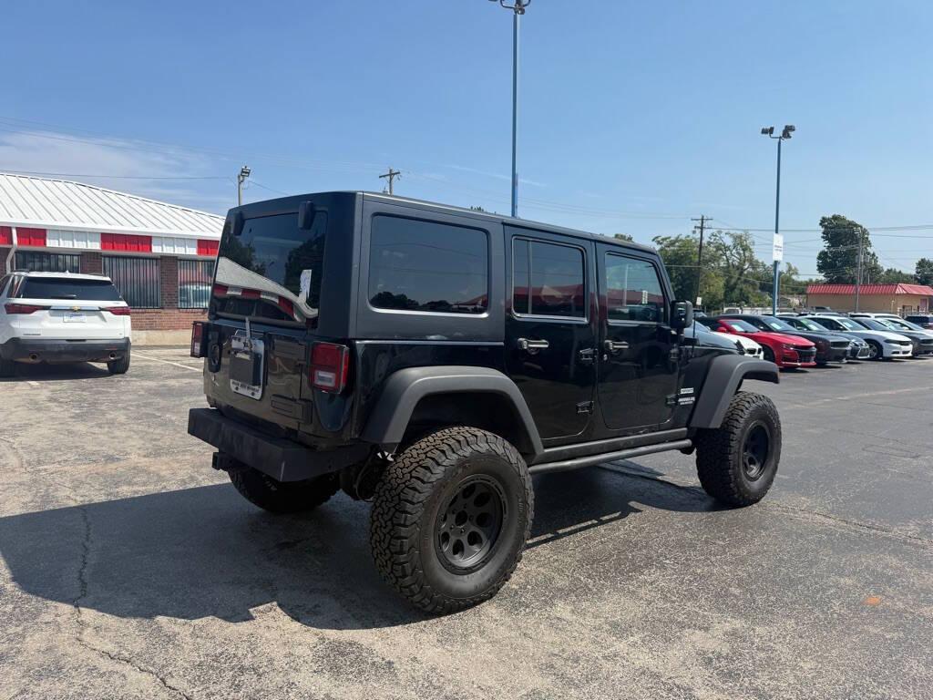 used 2013 Jeep Wrangler Unlimited car, priced at $13,988