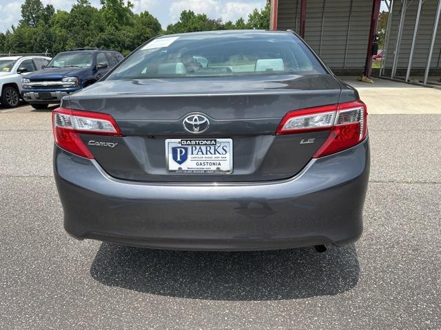 used 2014 Toyota Camry car, priced at $14,000