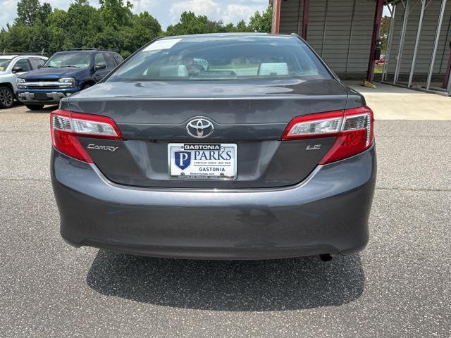 used 2014 Toyota Camry car, priced at $14,000