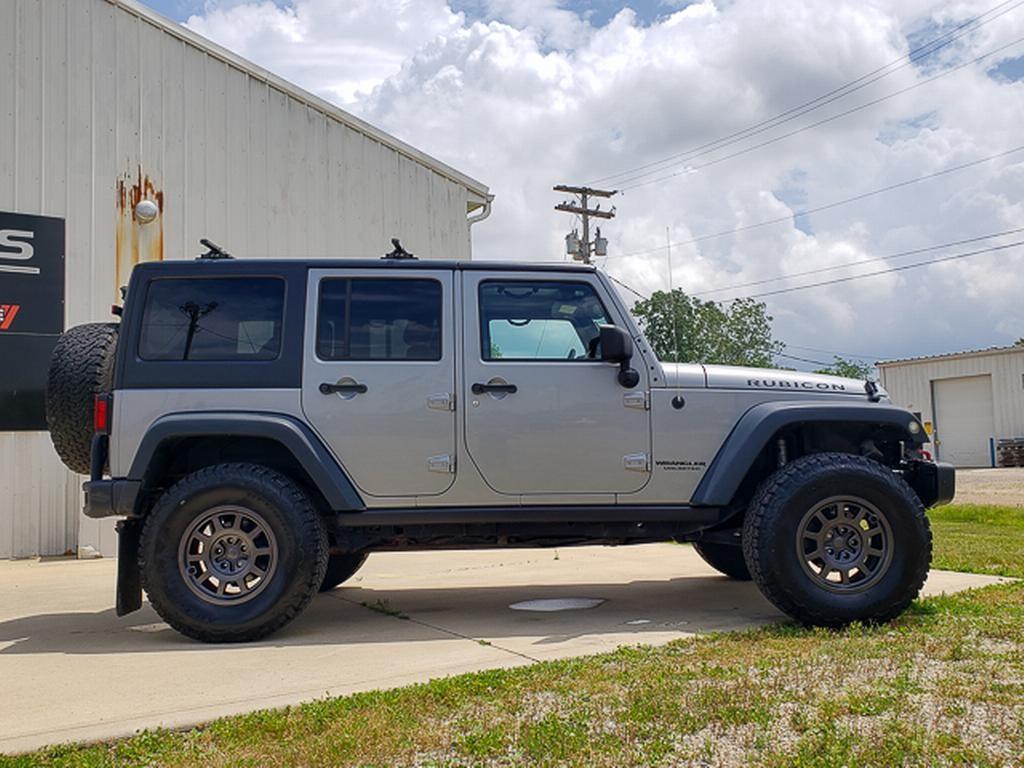 used 2013 Jeep Wrangler Unlimited car, priced at $12,285