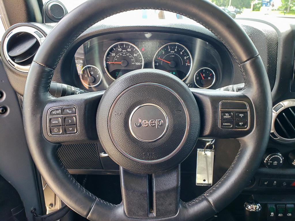 used 2013 Jeep Wrangler Unlimited car, priced at $12,285