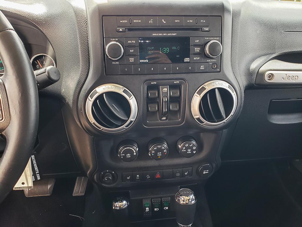 used 2013 Jeep Wrangler Unlimited car, priced at $12,285