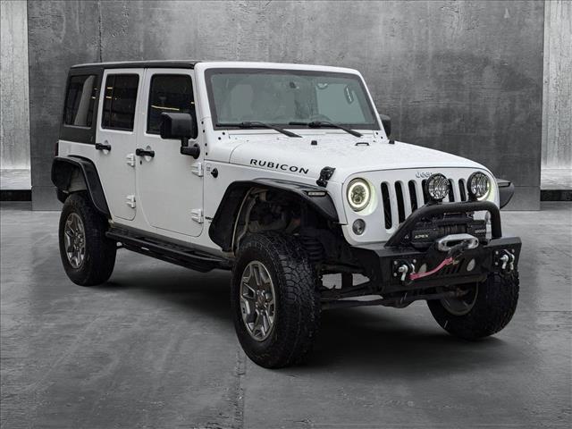 used 2015 Jeep Wrangler Unlimited car, priced at $25,620