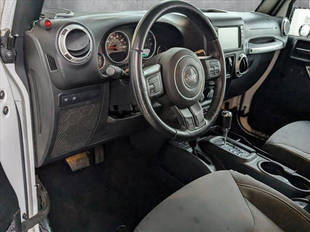 used 2015 Jeep Wrangler Unlimited car, priced at $25,620