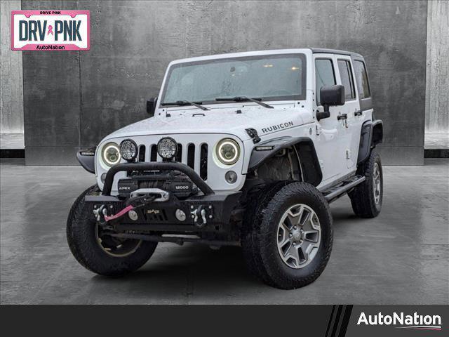 used 2015 Jeep Wrangler Unlimited car, priced at $25,620