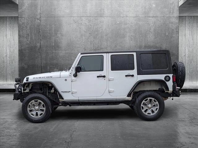 used 2015 Jeep Wrangler Unlimited car, priced at $25,620