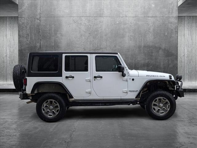 used 2015 Jeep Wrangler Unlimited car, priced at $25,620