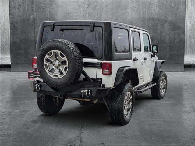 used 2015 Jeep Wrangler Unlimited car, priced at $25,620