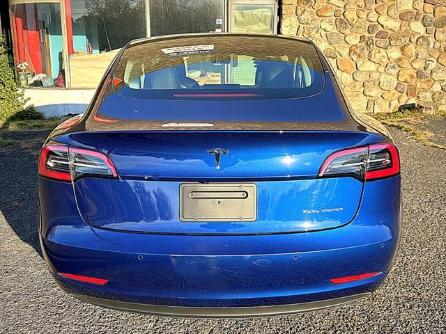 used 2022 Tesla Model 3 car, priced at $27,995