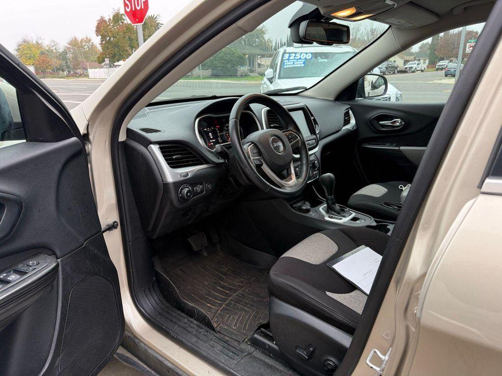used 2014 Jeep Cherokee car, priced at $13,000