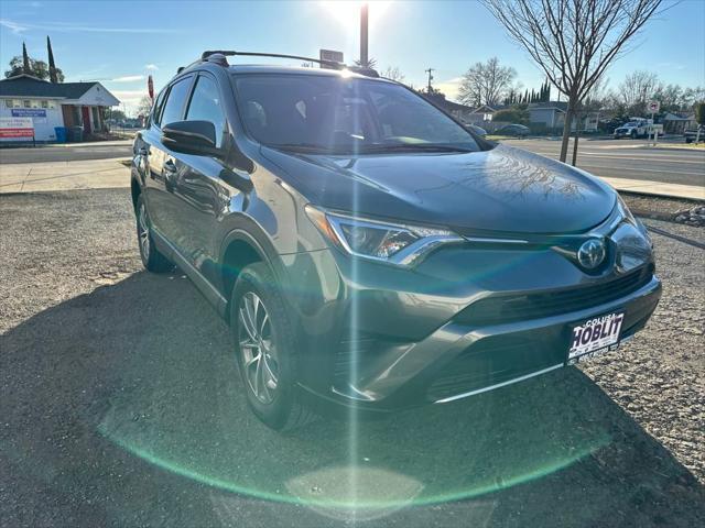 used 2018 Toyota RAV4 Hybrid car, priced at $24,634