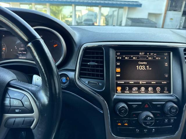 used 2014 Jeep Grand Cherokee car, priced at $9,897