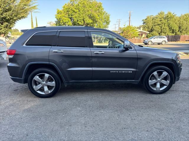 used 2014 Jeep Grand Cherokee car, priced at $9,897