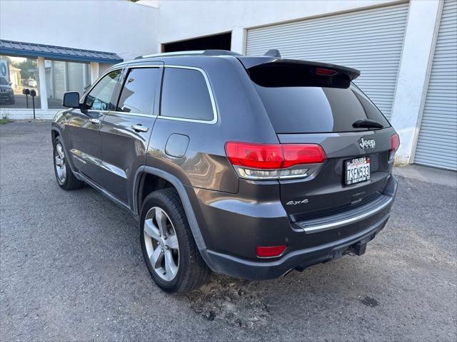 used 2014 Jeep Grand Cherokee car, priced at $9,897