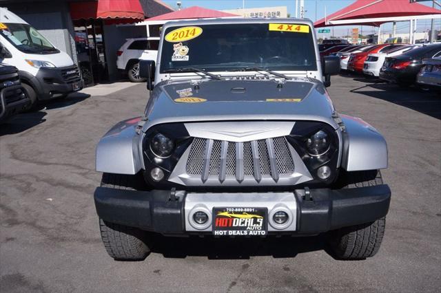 used 2014 Jeep Wrangler Unlimited car, priced at $18,889