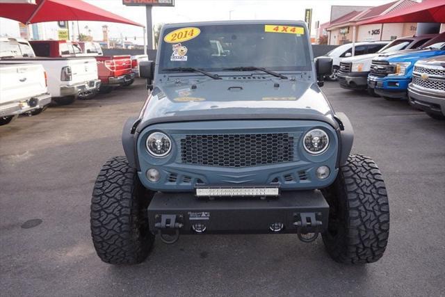 used 2014 Jeep Wrangler car, priced at $18,998