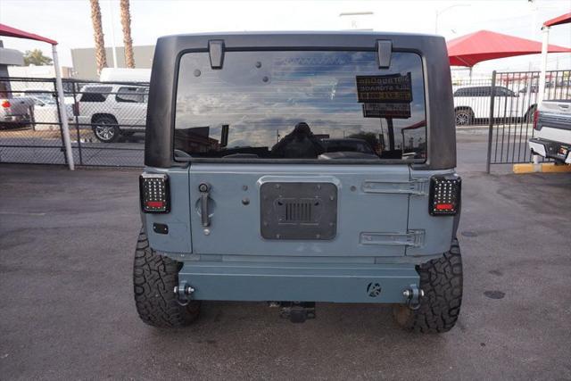 used 2014 Jeep Wrangler car, priced at $18,998