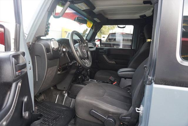 used 2014 Jeep Wrangler car, priced at $18,998