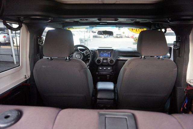 used 2014 Jeep Wrangler car, priced at $18,998