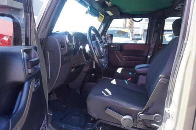 used 2015 Jeep Wrangler Unlimited car, priced at $24,998