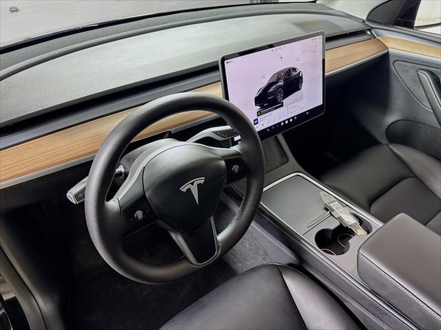 used 2025 Tesla Model Y car, priced at $42,490