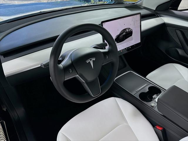 used 2023 Tesla Model 3 car, priced at $35,990