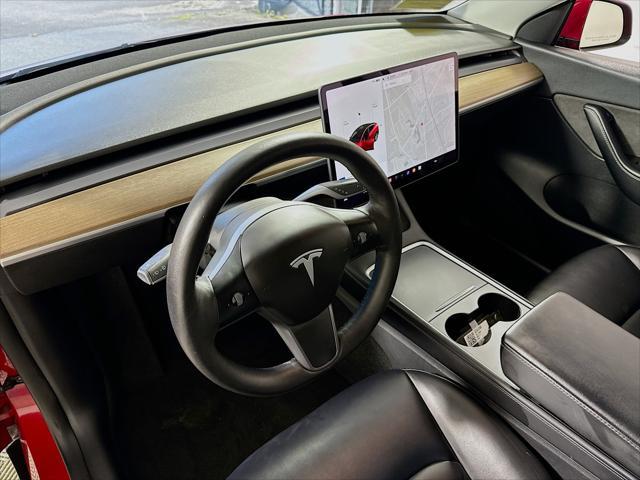 used 2022 Tesla Model Y car, priced at $29,590