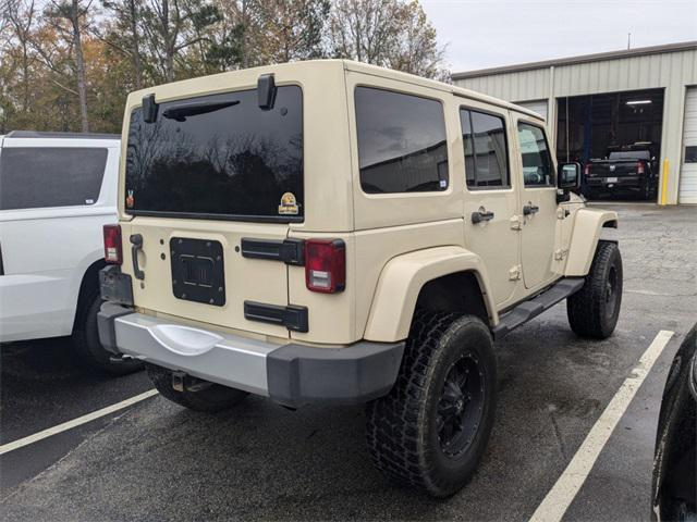 used 2011 Jeep Wrangler Unlimited car, priced at $16,899