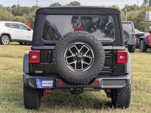 used 2024 Jeep Wrangler car, priced at $47,099