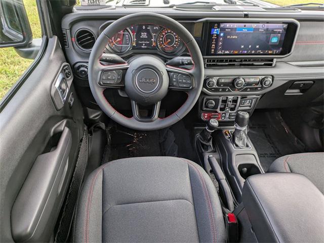used 2024 Jeep Wrangler car, priced at $47,099