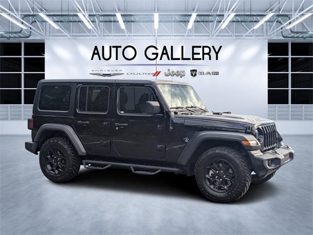 used 2023 Jeep Wrangler car, priced at $33,954