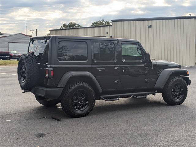 used 2023 Jeep Wrangler car, priced at $33,954