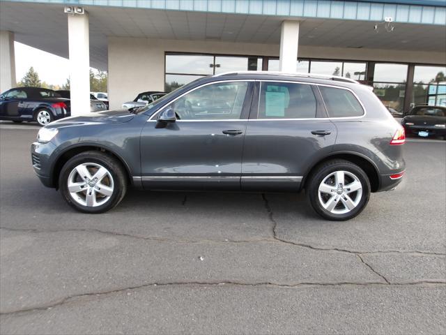 used 2013 Volkswagen Touareg Hybrid car, priced at $15,995