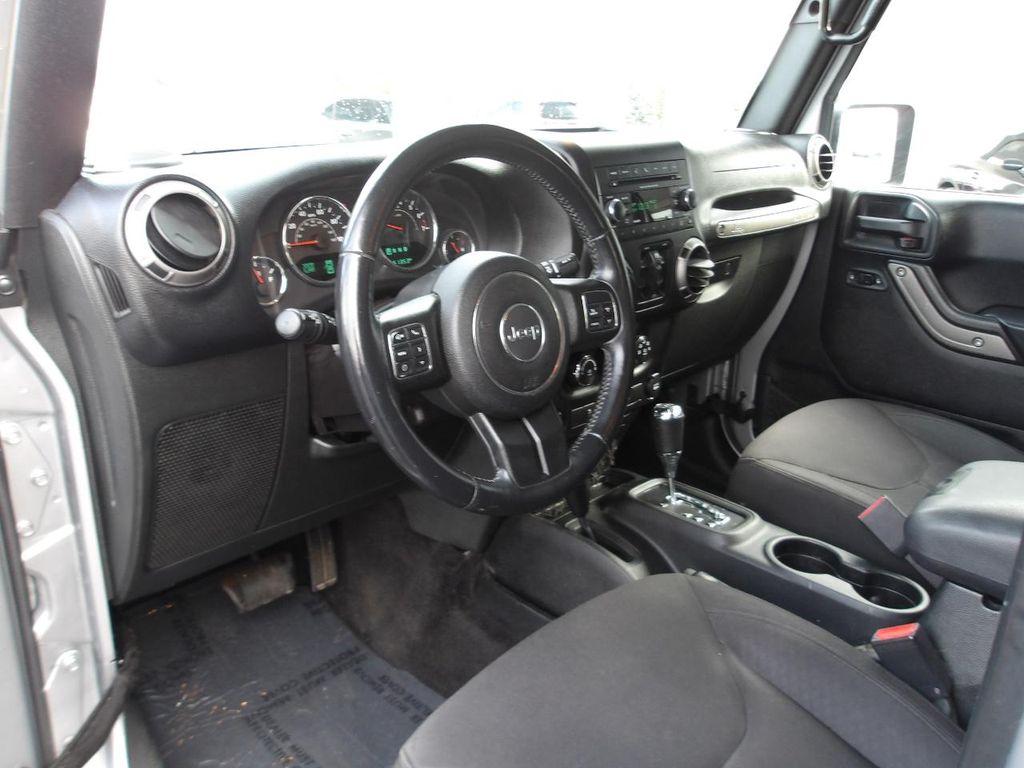 used 2015 Jeep Wrangler Unlimited car, priced at $12,995