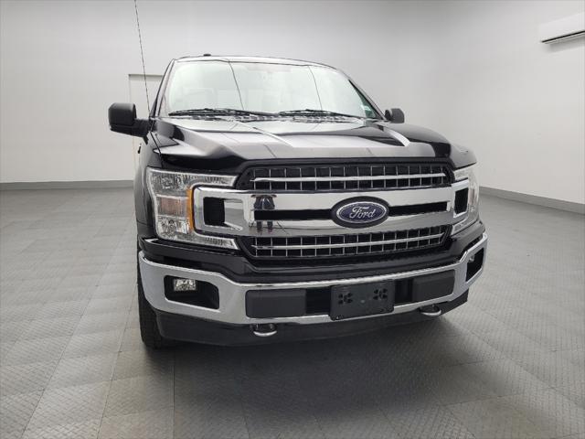 used 2018 Ford F-150 car, priced at $23,695