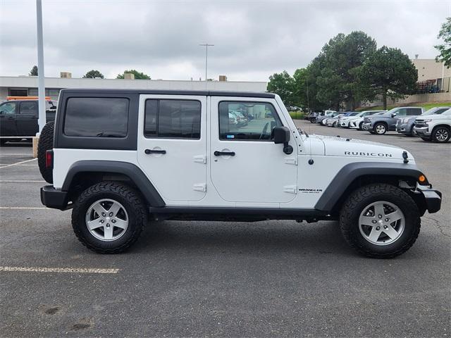 used 2011 Jeep Wrangler Unlimited car, priced at $15,498