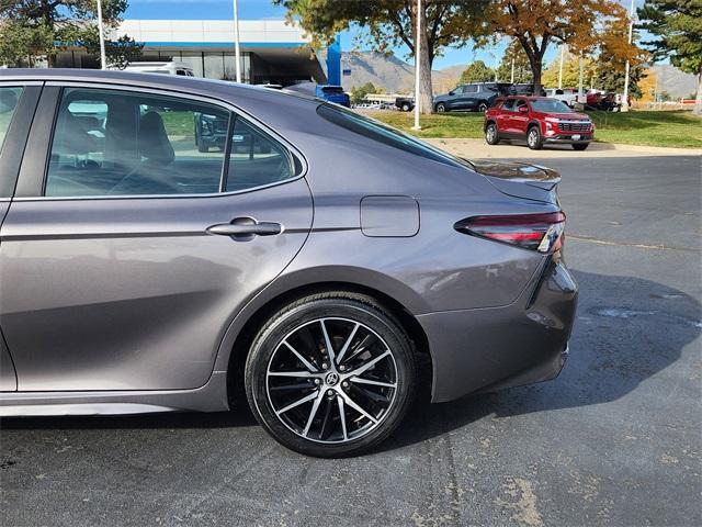 used 2021 Toyota Camry car, priced at $19,853