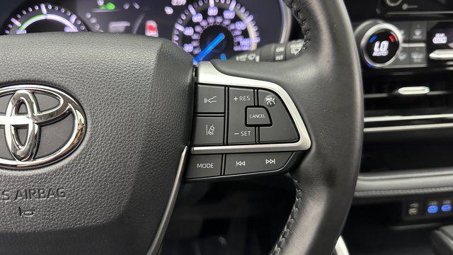 used 2022 Toyota Highlander Hybrid car, priced at $29,600
