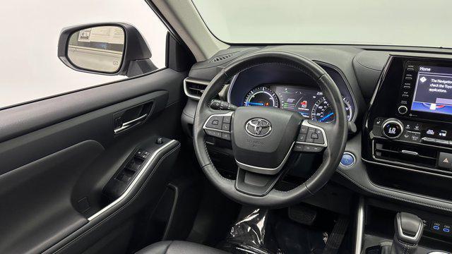 used 2022 Toyota Highlander Hybrid car, priced at $29,600