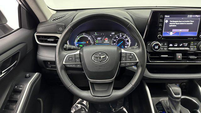 used 2022 Toyota Highlander Hybrid car, priced at $29,600