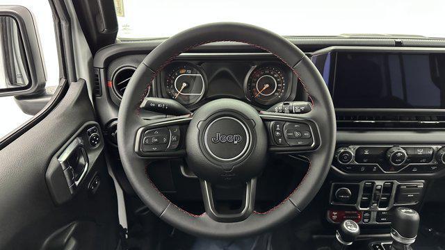 used 2025 Jeep Wrangler car, priced at $38,100