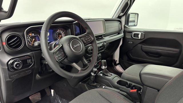 used 2025 Jeep Wrangler car, priced at $38,100