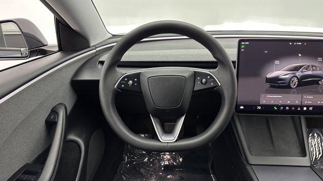 used 2024 Tesla Model 3 car, priced at $29,500
