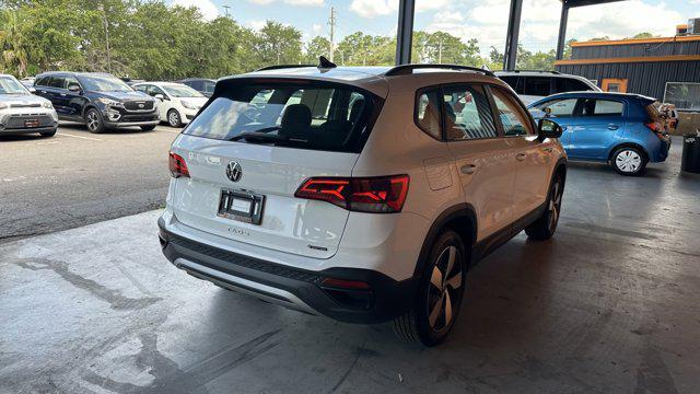 used 2024 Volkswagen Taos car, priced at $21,600